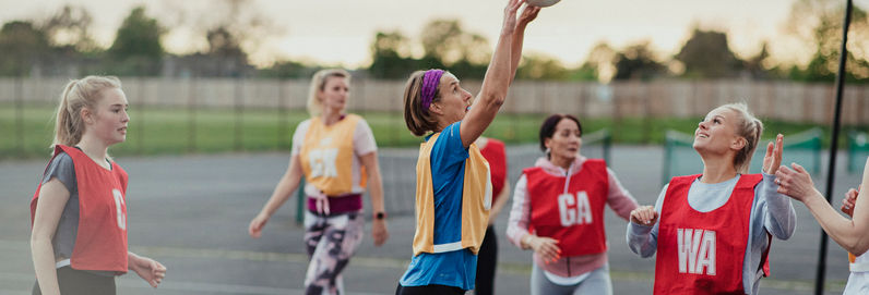 a group of people paying netball