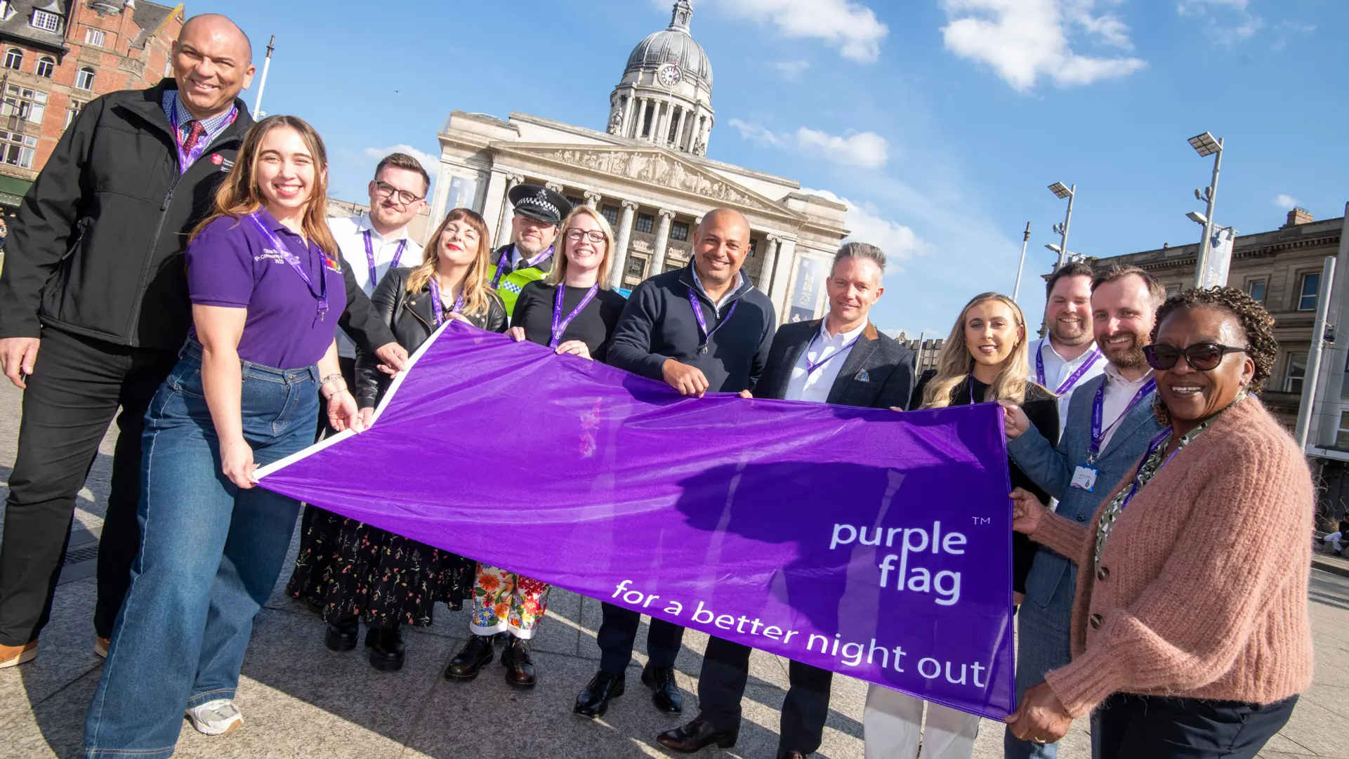 a group of people posing for the camera