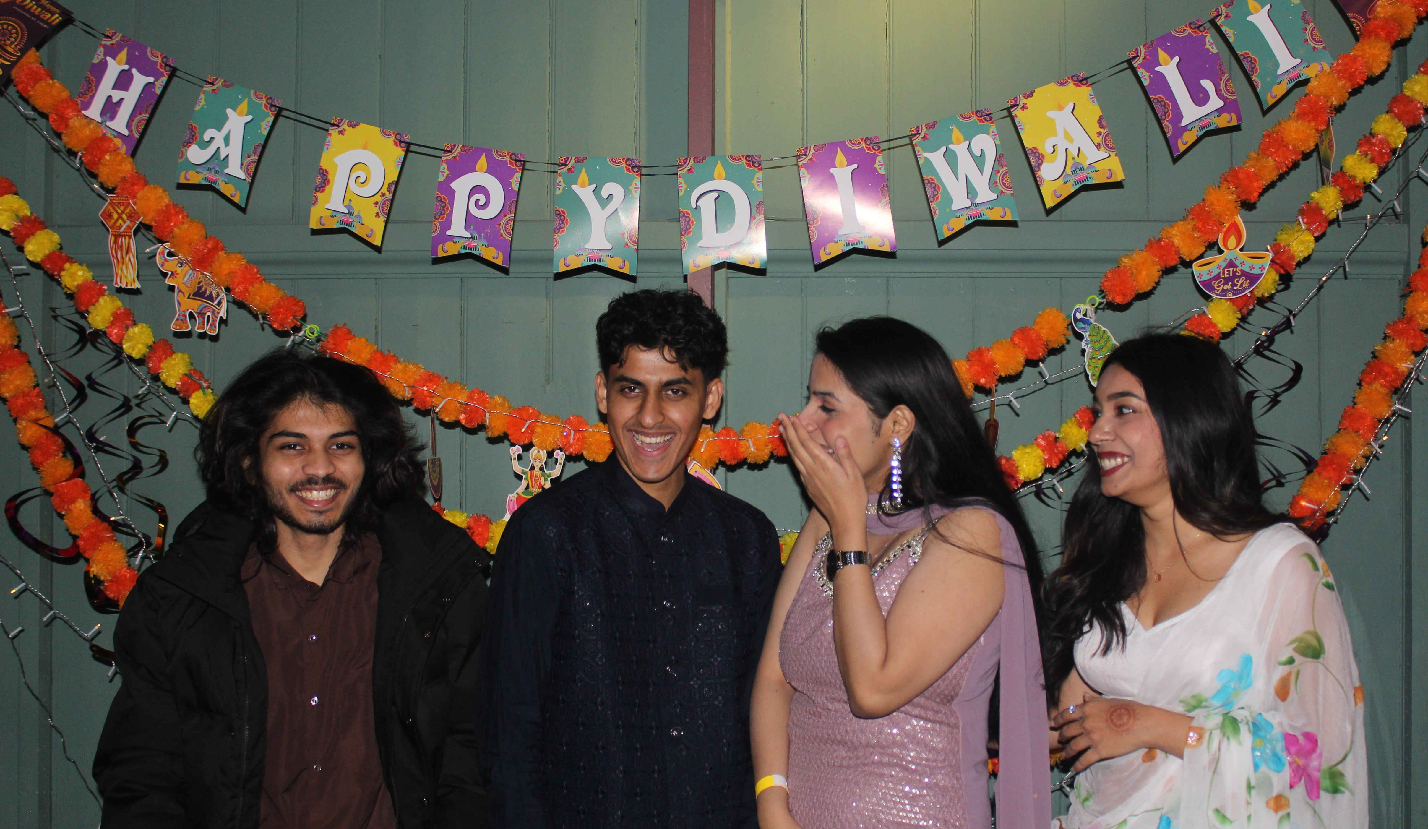 a group of people posing for the camera