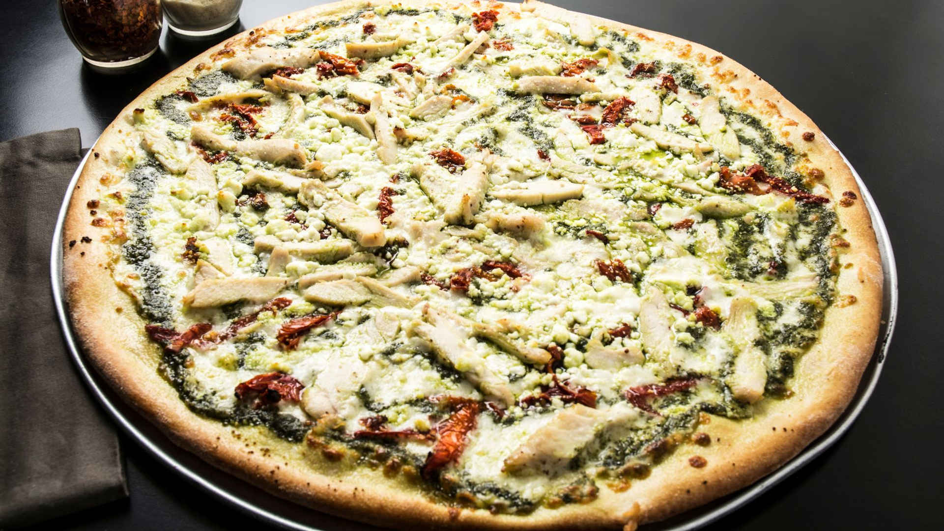 a pizza sitting on top of a table