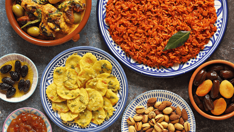a bowl filled with different types of food on a table