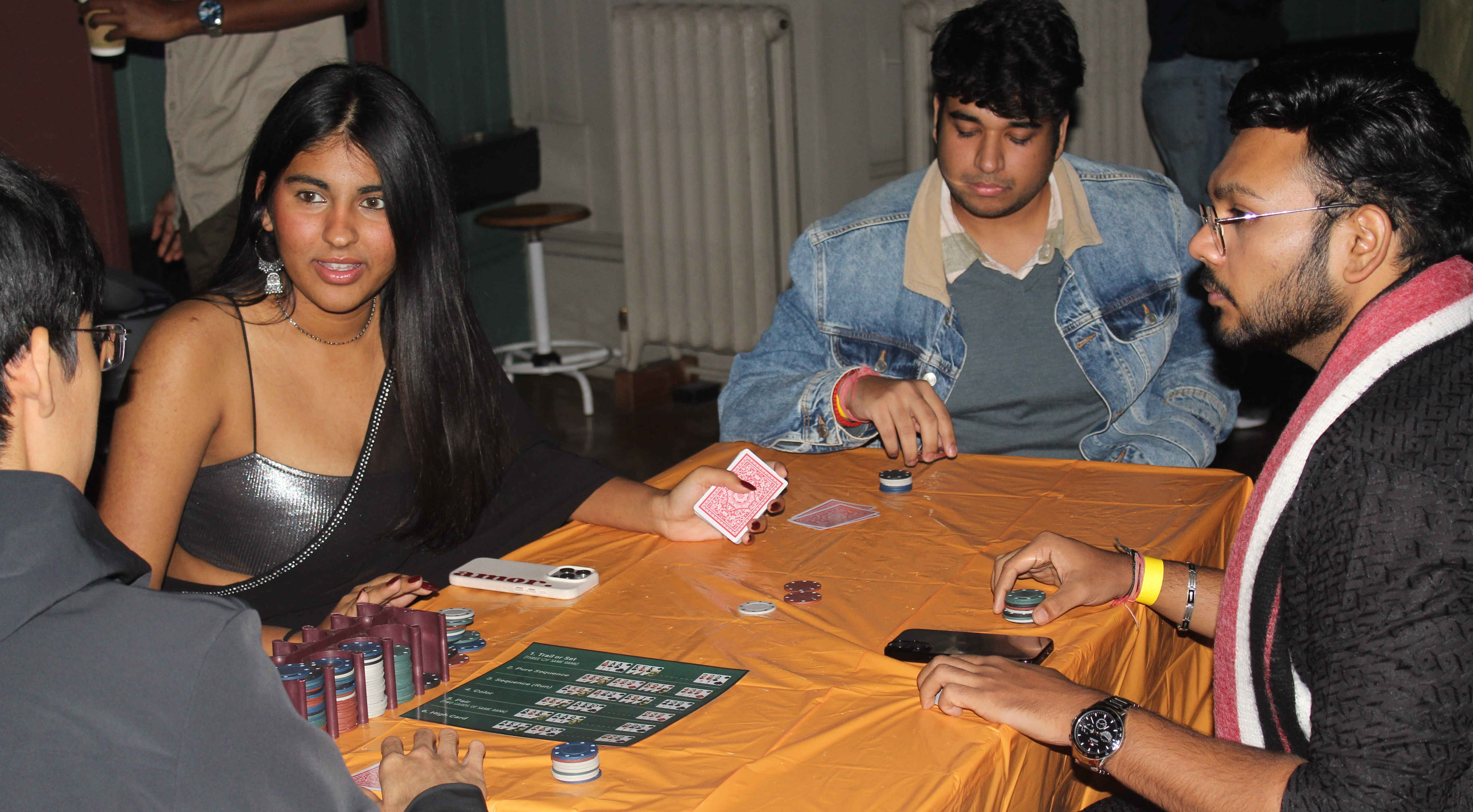 a group of people sitting at a table