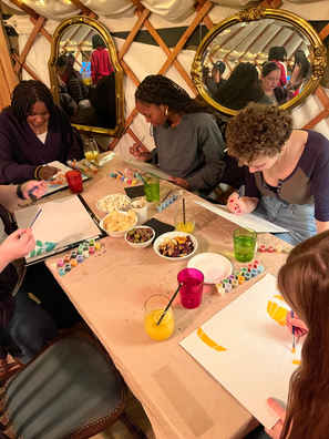 a group of people sitting at a table